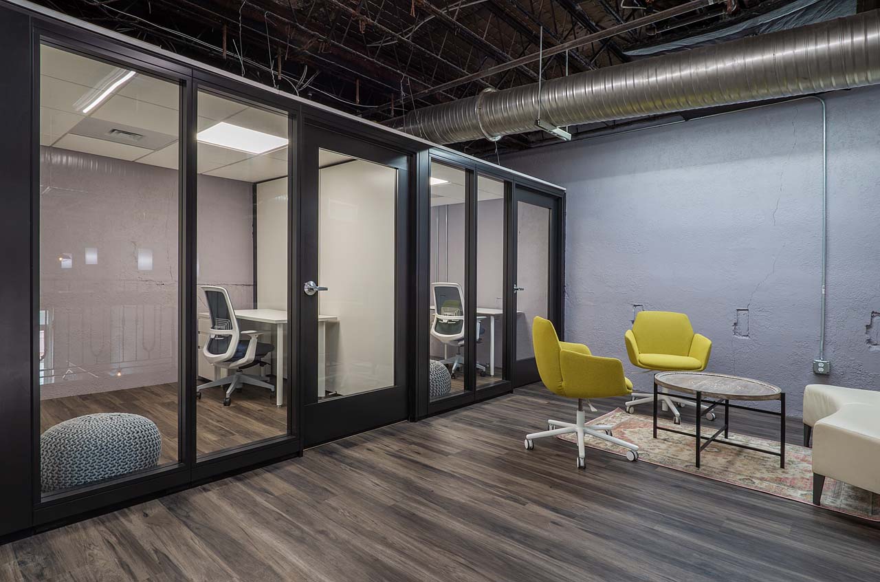 A loft space with private phone booths